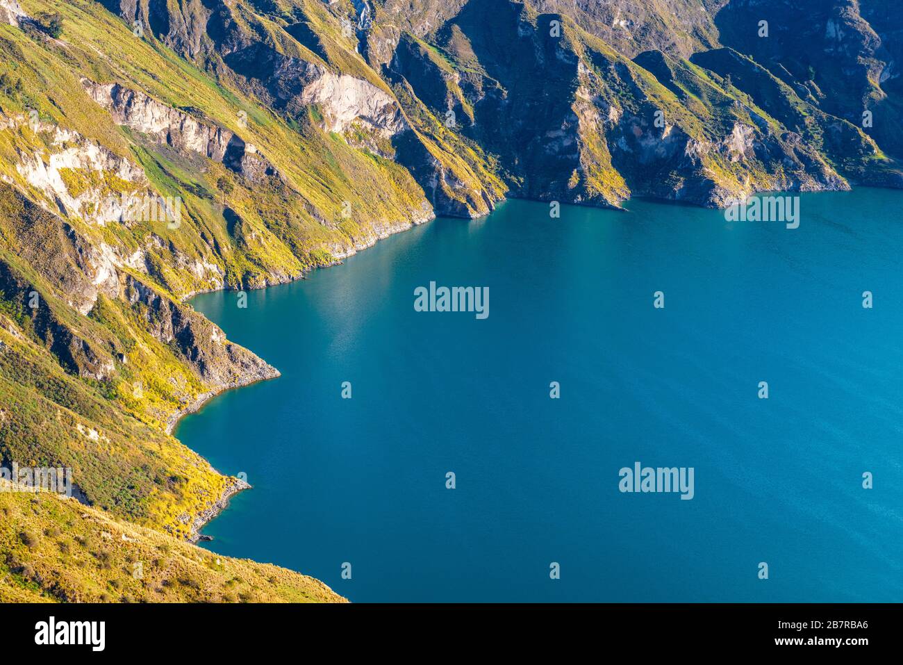 The turquoise crater lagoon of Quilotoa, a dormant volcano, seen along the Quilotoa Loop hike. Located near Latacunga city, south of Quito, Ecuador. Stock Photo