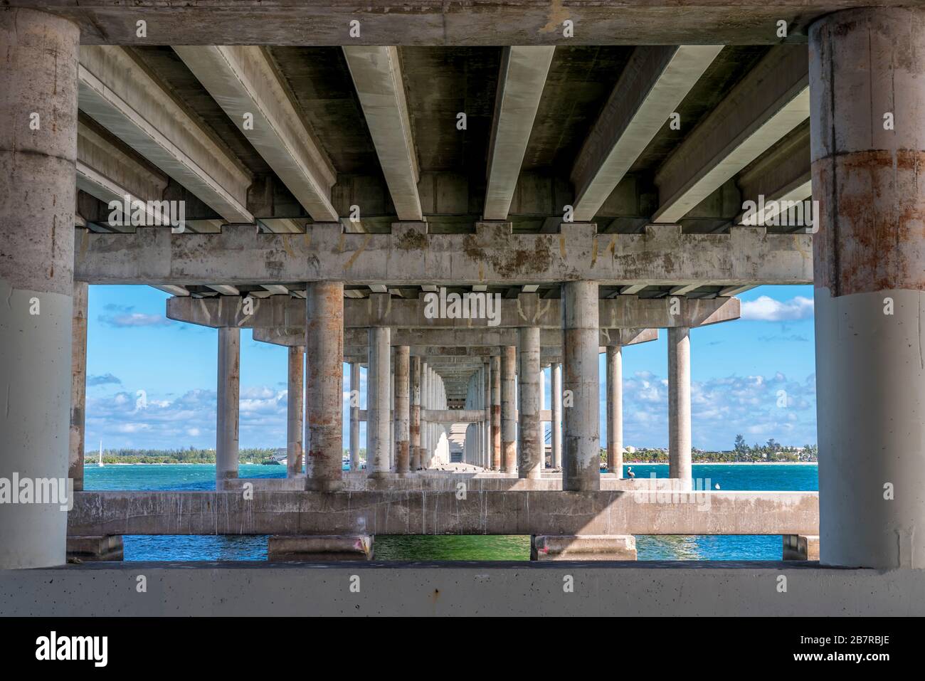 A view from underneath a concrete bridge in Florida Stock Photo