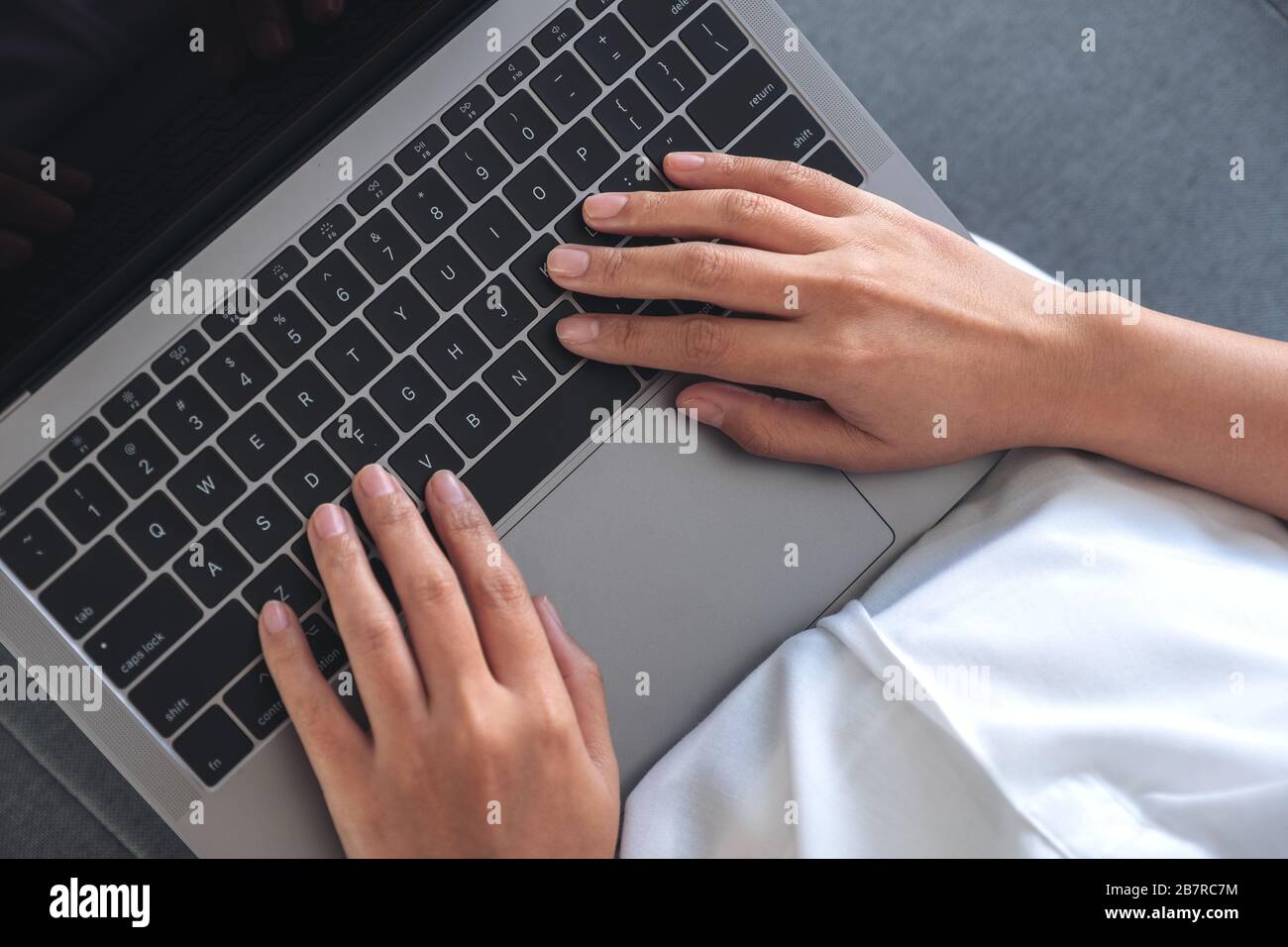 Hands typing laptop keyboard top hi-res stock photography and images ...
