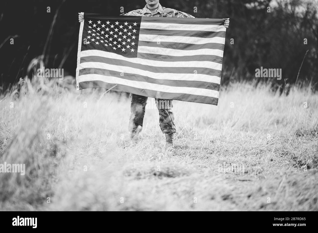 American soldier with flag Black and White Stock Photos & Images - Alamy