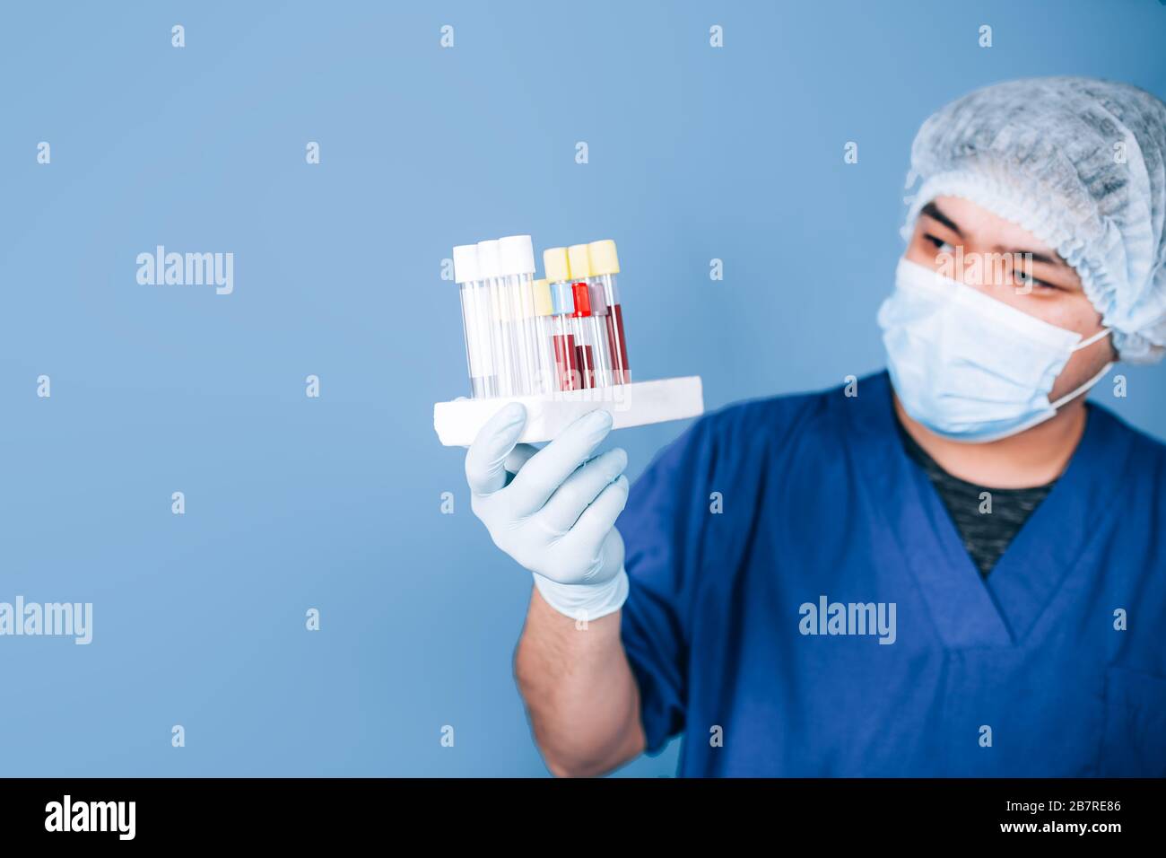 doctor holding test tubes Stock Photo