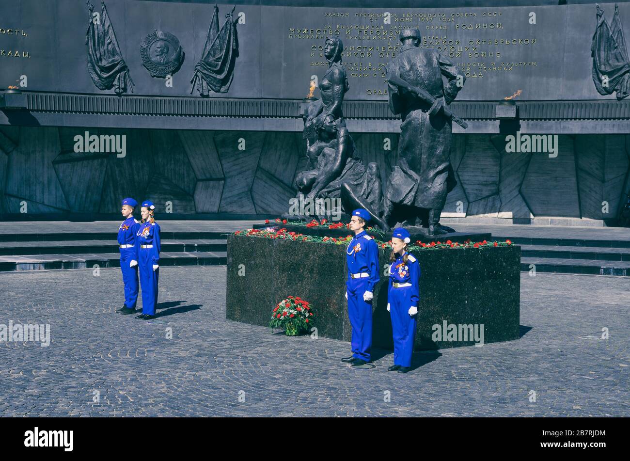 Saint Petersburg, Russia - May 05, 2016: Four cadets at attention at the memorial 'Monument to the heroic defenders of Leningrad 1941-1944' on the eve Stock Photo