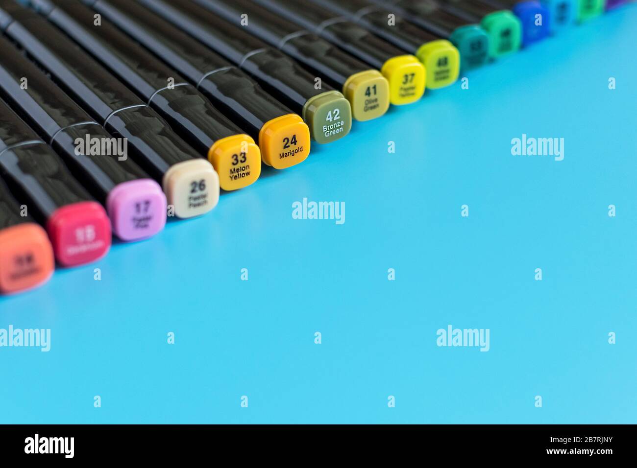 https://c8.alamy.com/comp/2B7RJNY/multi-colored-markers-on-a-blue-background-marker-for-drawing-and-creativity-2B7RJNY.jpg
