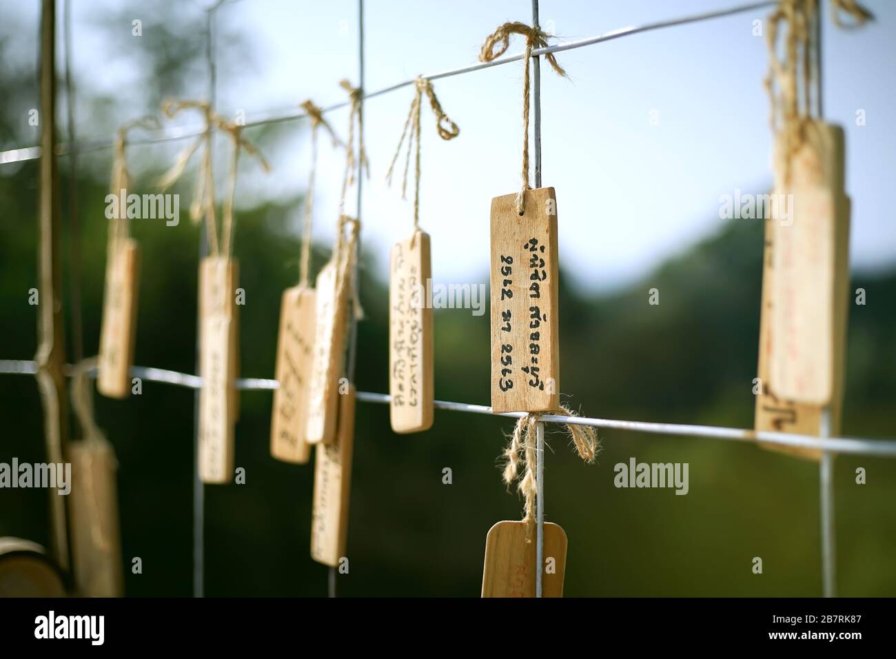 Wooden tag of I love Sangkhla Buri district in Kanchanaburi, Thailand. (Translation:I love Sangkhla Buri) Stock Photo