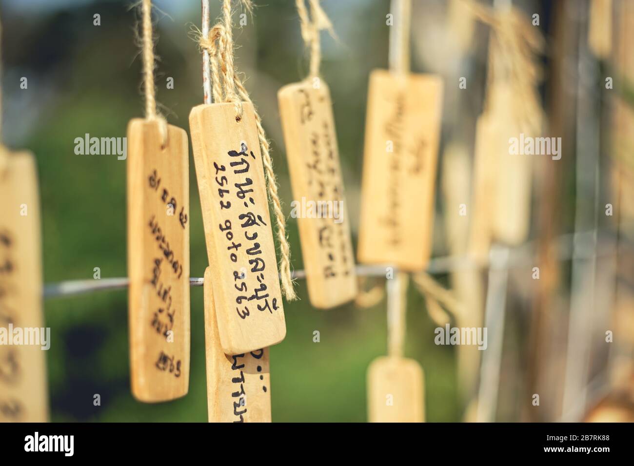 Wooden tag of I love Sangkhla Buri district in Kanchanaburi, Thailand. (Translation:I love Sangkhla Buri) Stock Photo