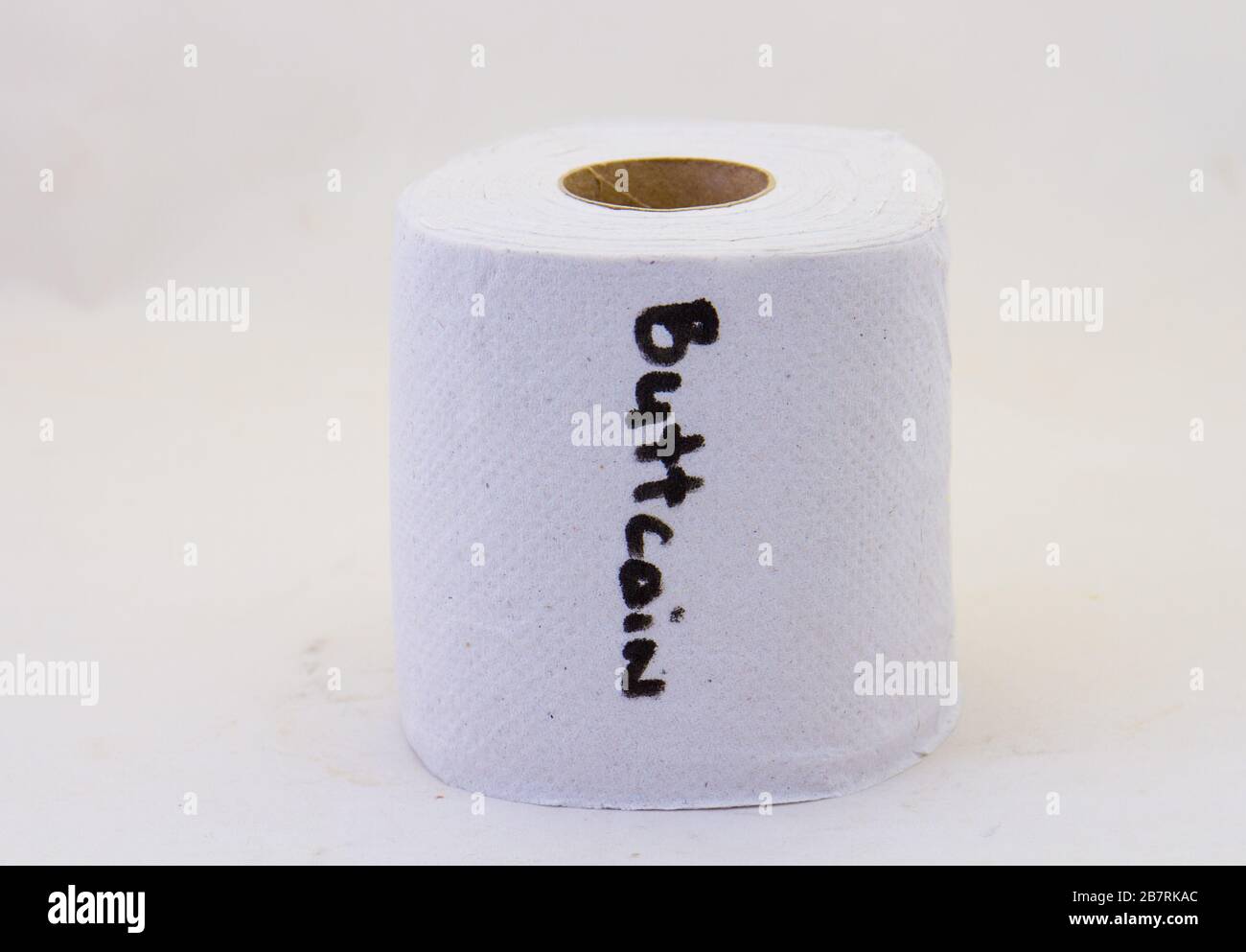 A roll of white toilet paper with the word buttcoin printed on it image