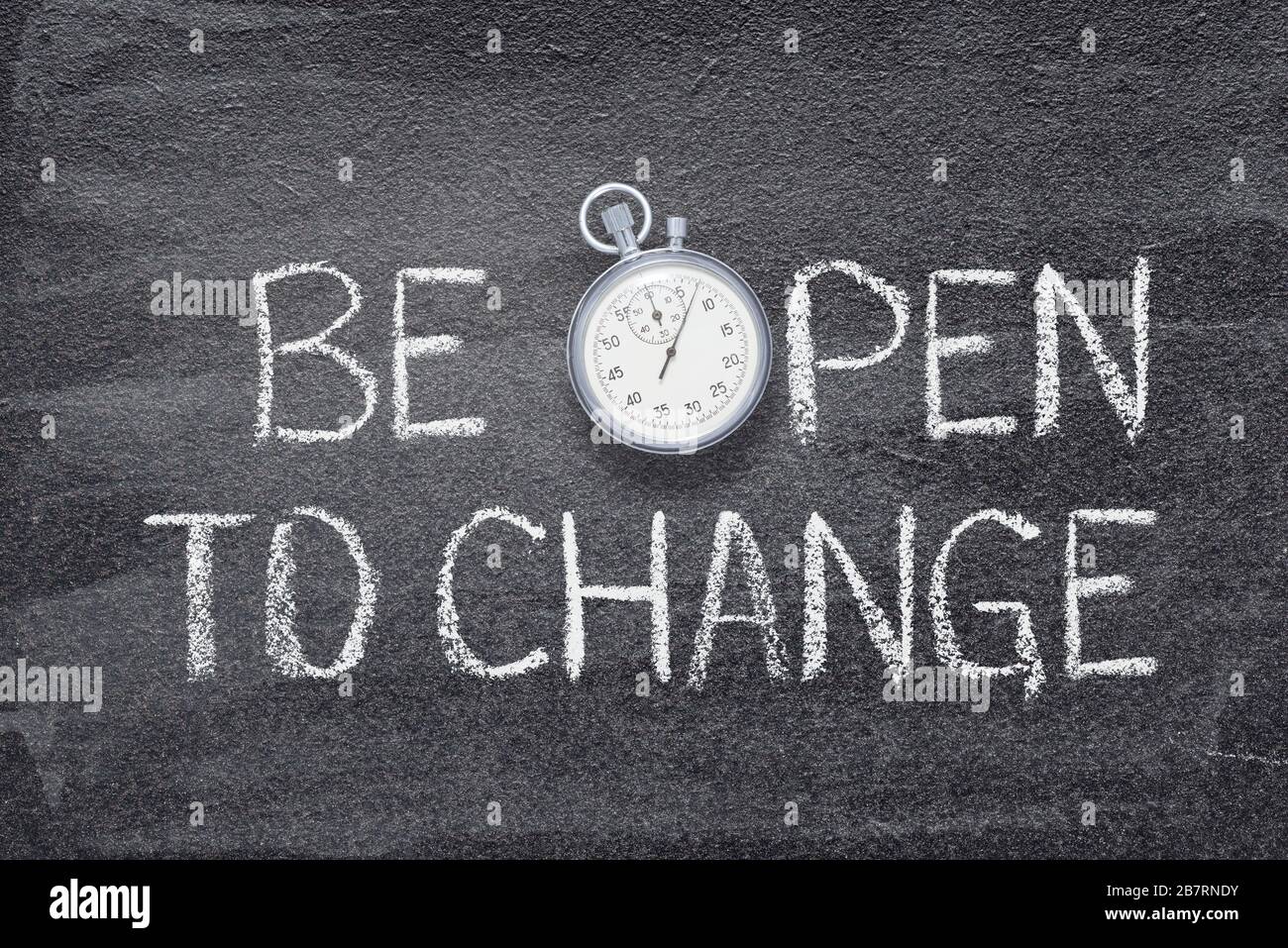 be open to change phrase written on chalkboard with vintage precise stopwatch Stock Photo