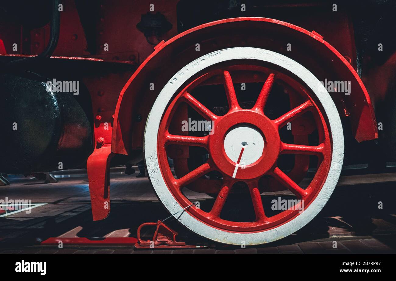 Red wheel of old retro steam train at railway museum Stock Photo