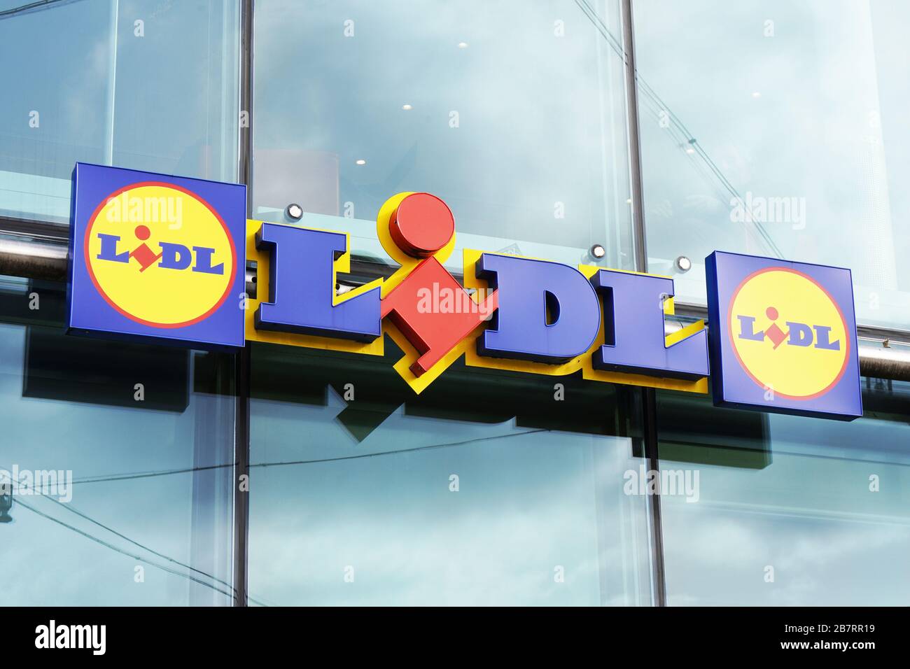 Hannover, Germany - March 02, 2020: Lidl logo sign at local branch of german discounter supermarket chain Stock Photo