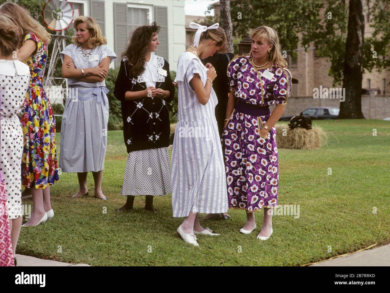 Austin, Texas USA, circa 1992 College girls wearing similar dresses to