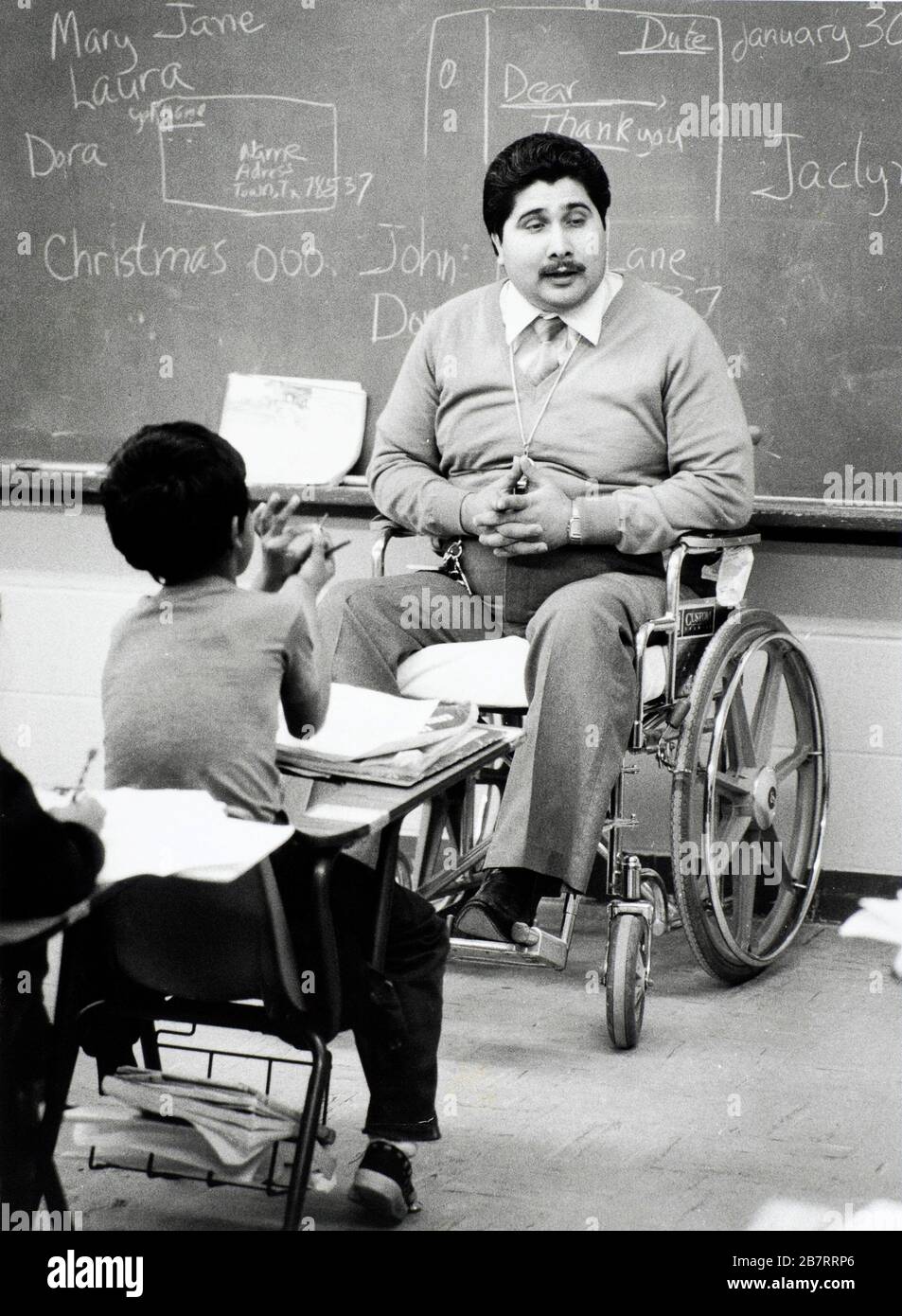Edinburg Texas USA,1990 Handicapped Hispanic teacher works with