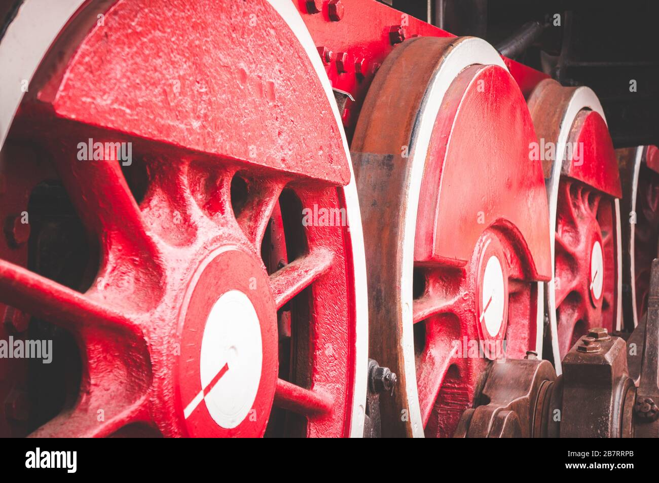 Red wheels of old retro steam train at railway museum Stock Photo