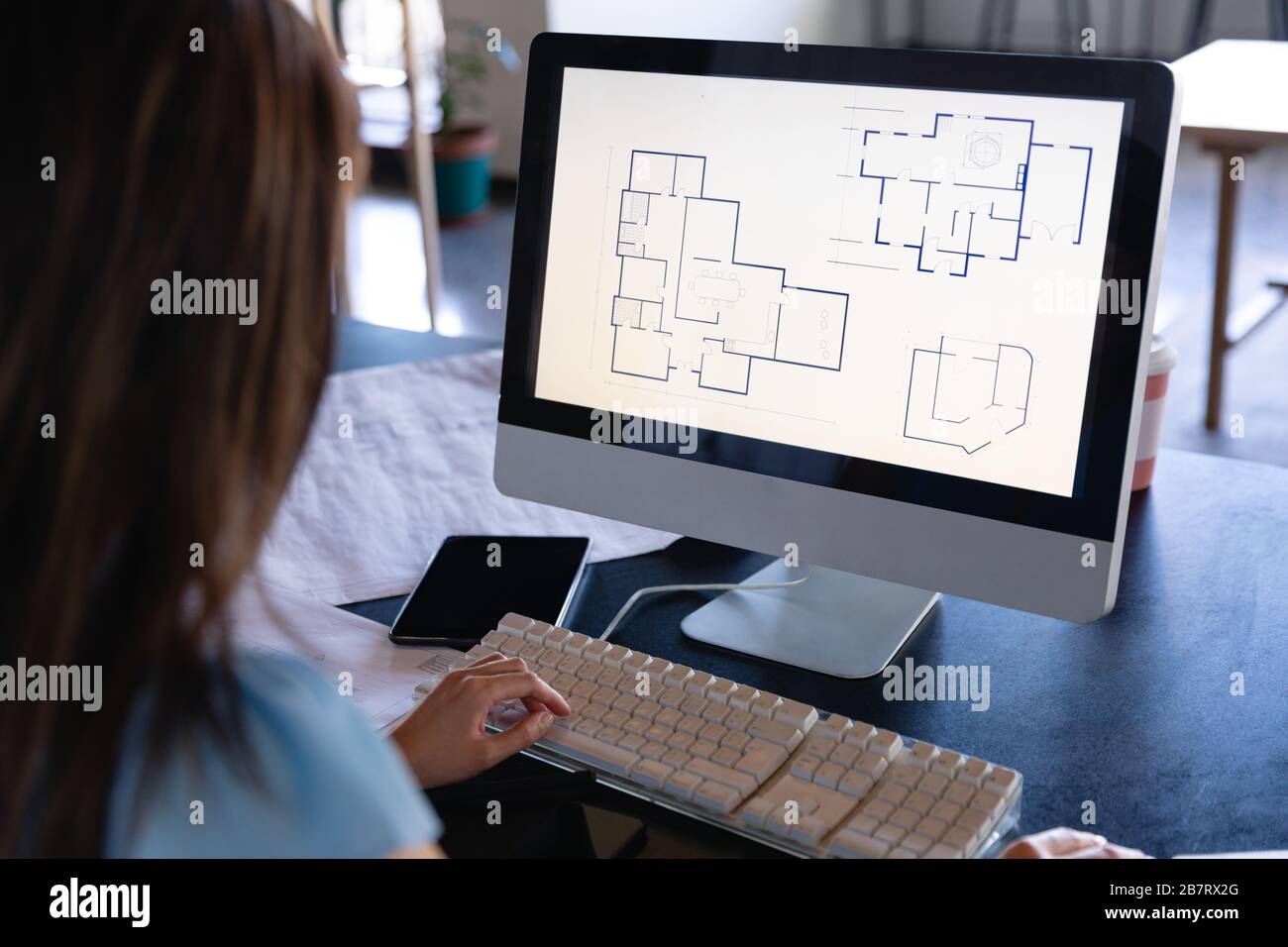 Architect At Computer