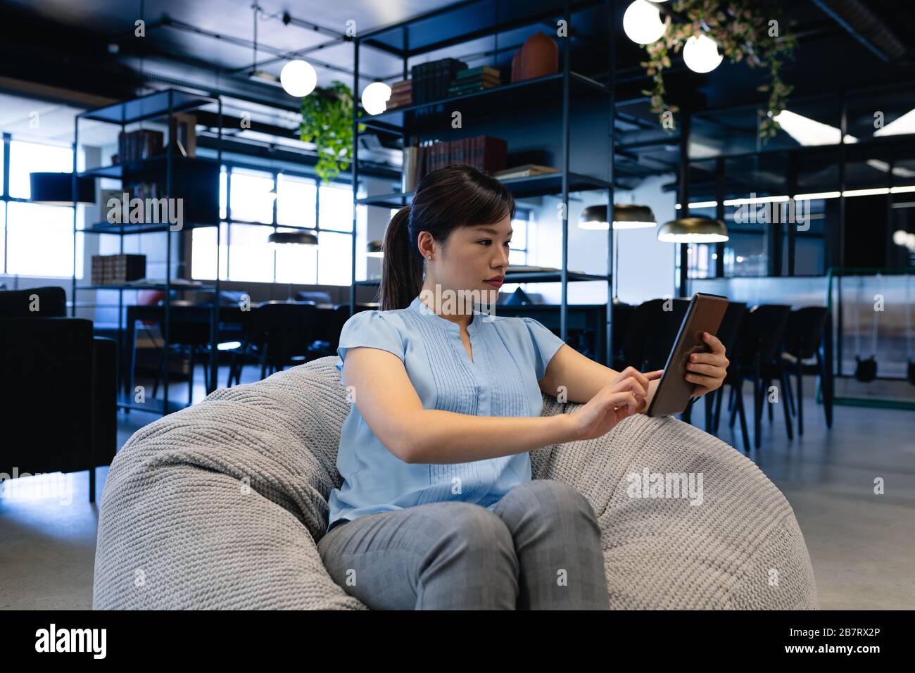 Woman holding work bag hi-res stock photography and images - Alamy