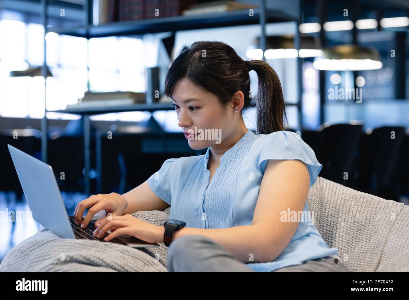 Woman Sitting On Bean Bag High Resolution Stock Photography and Images ...