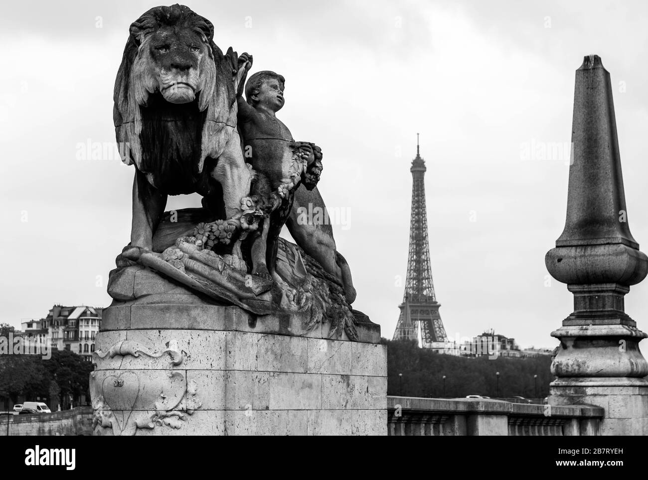 Lion a l'Enfant statue on the Pont Alexandre III NW corner, Paris France Stock Photo