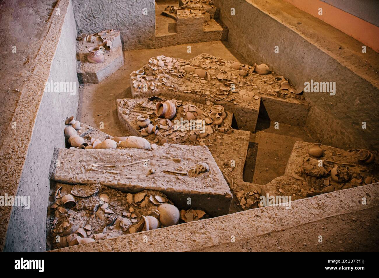 JAN 12, 2019 Udon Thani, Thailand - Ancient pottery containers and prehistory human bones in Excavation site of Ban Chiang Museum Stock Photo