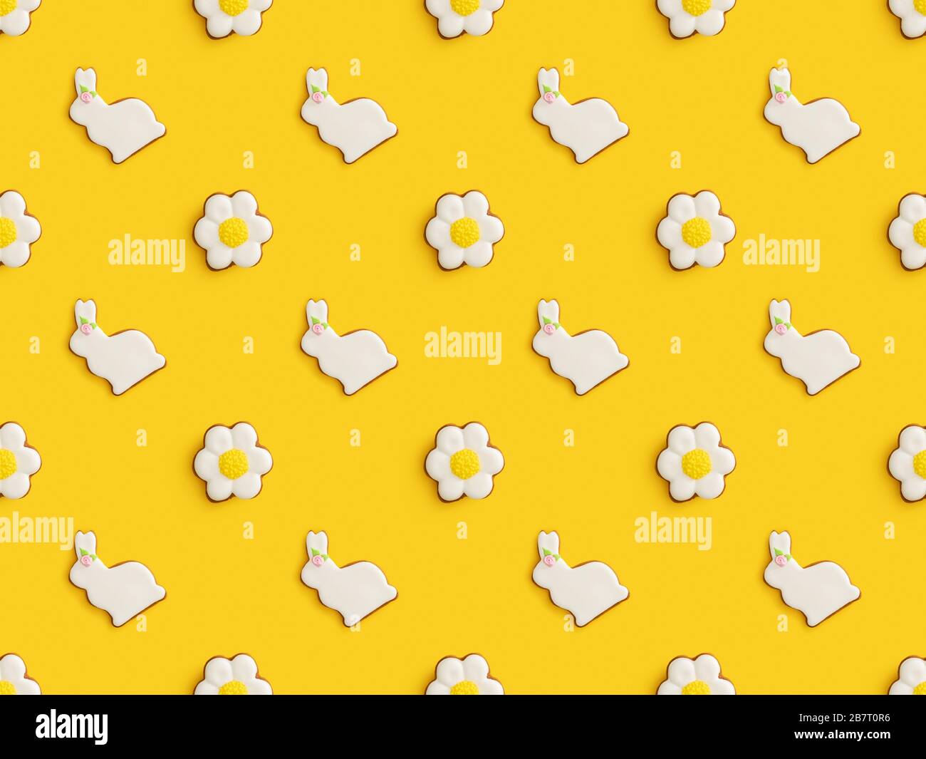Flat lay with tasty easter cookies isolated on yellow background, seamless pattern Stock Photo