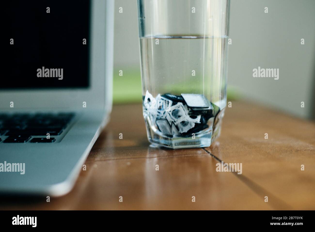 cleaning laptop keys in water. Laptop repair Stock Photo Alamy