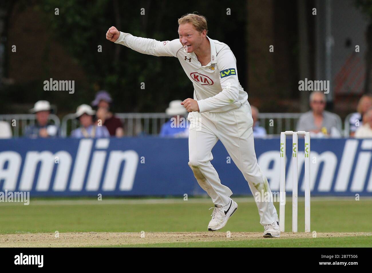 Gareth Batty of Surrey CCC celebrates taking the wicket of Ravi Bopara Stock Photo