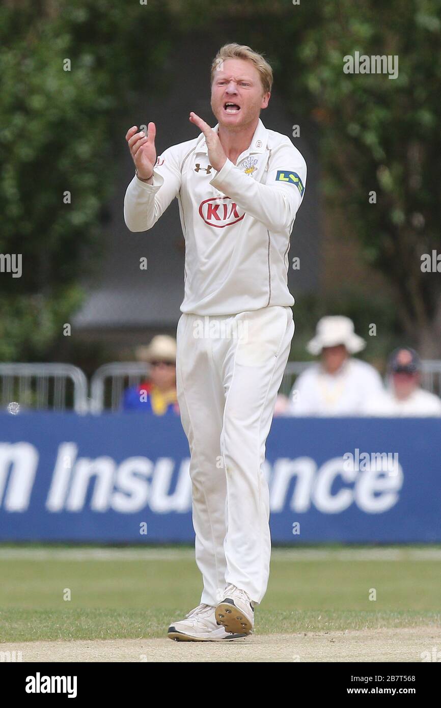 Gareth Batty of Surrey CCC celebrates taking the wicket of Mark Pettini Stock Photo
