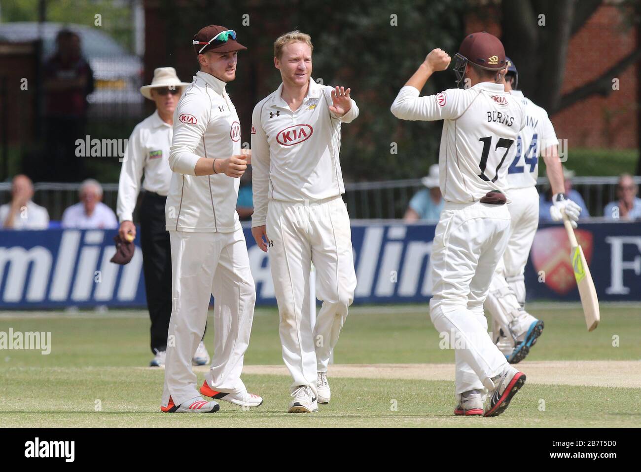 Gareth Batty of Surrey CCC (C) claims the wicket of Tom Westley Stock Photo