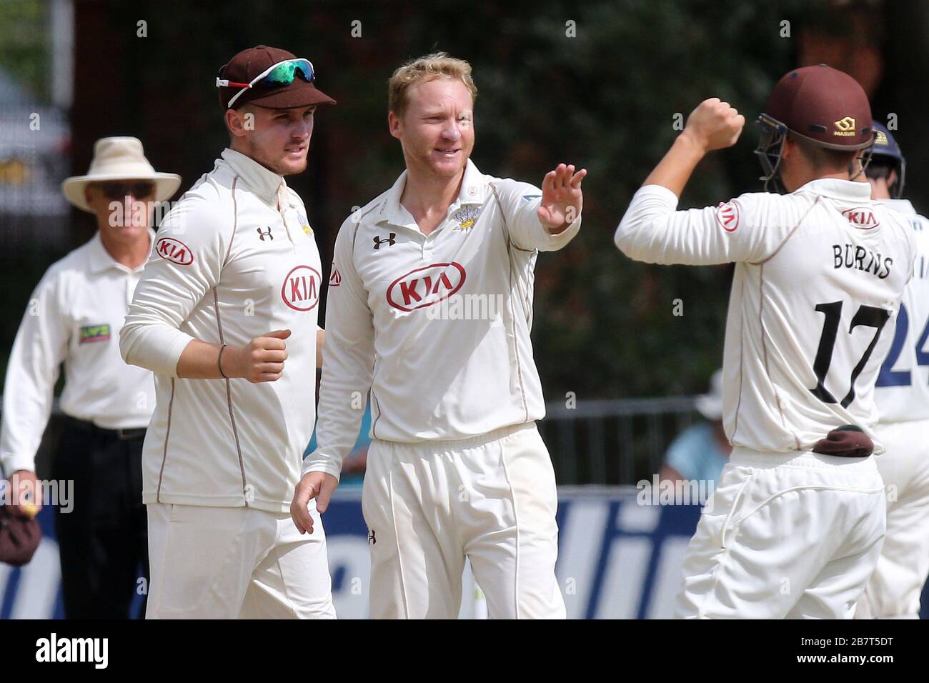 Gareth Batty of Surrey CCC (C) claims the wicket of Tom Westley Stock Photo