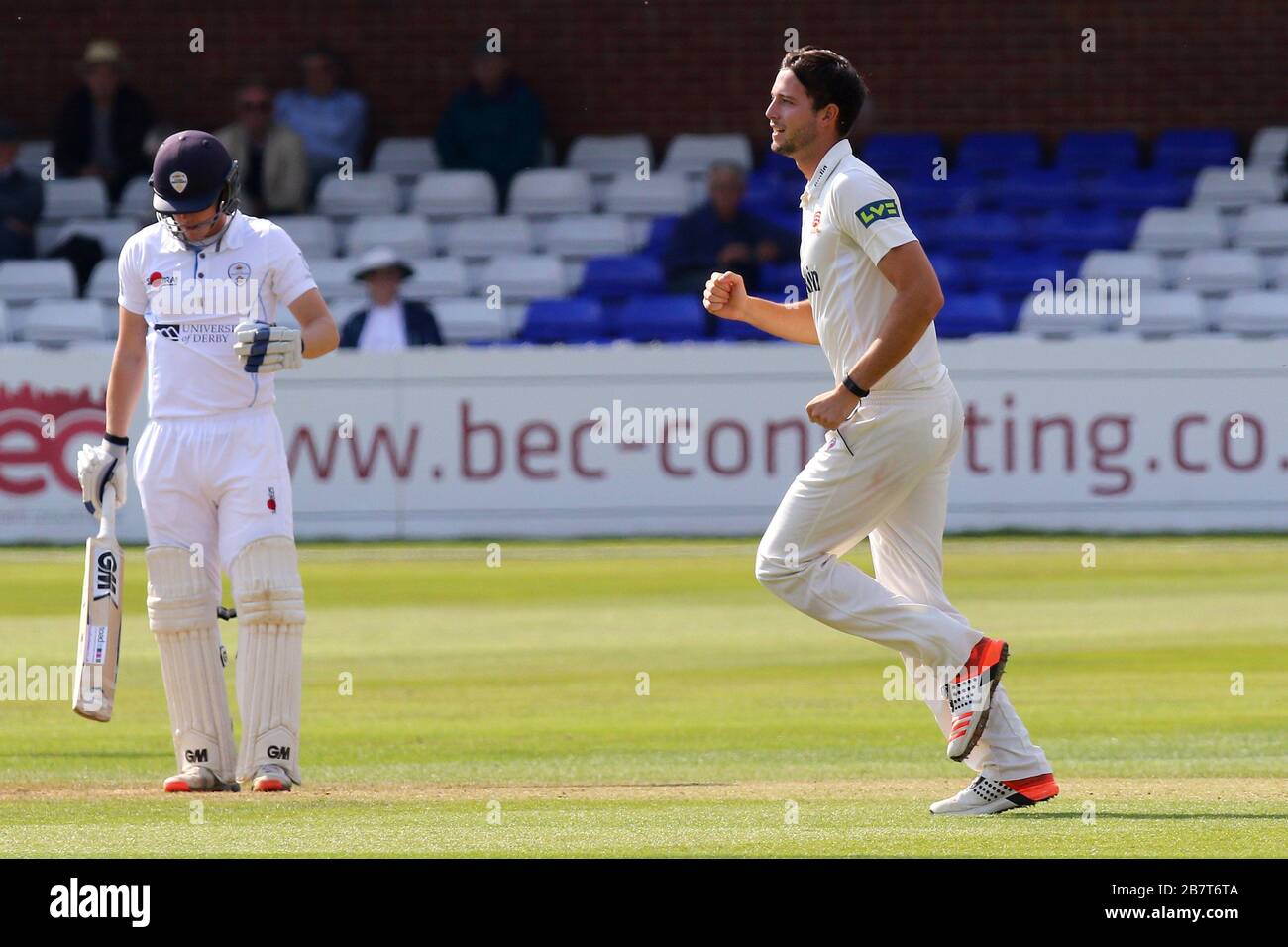 Tom Moore of Essex celebrates taking the wicket of Ben Slater Stock Photo