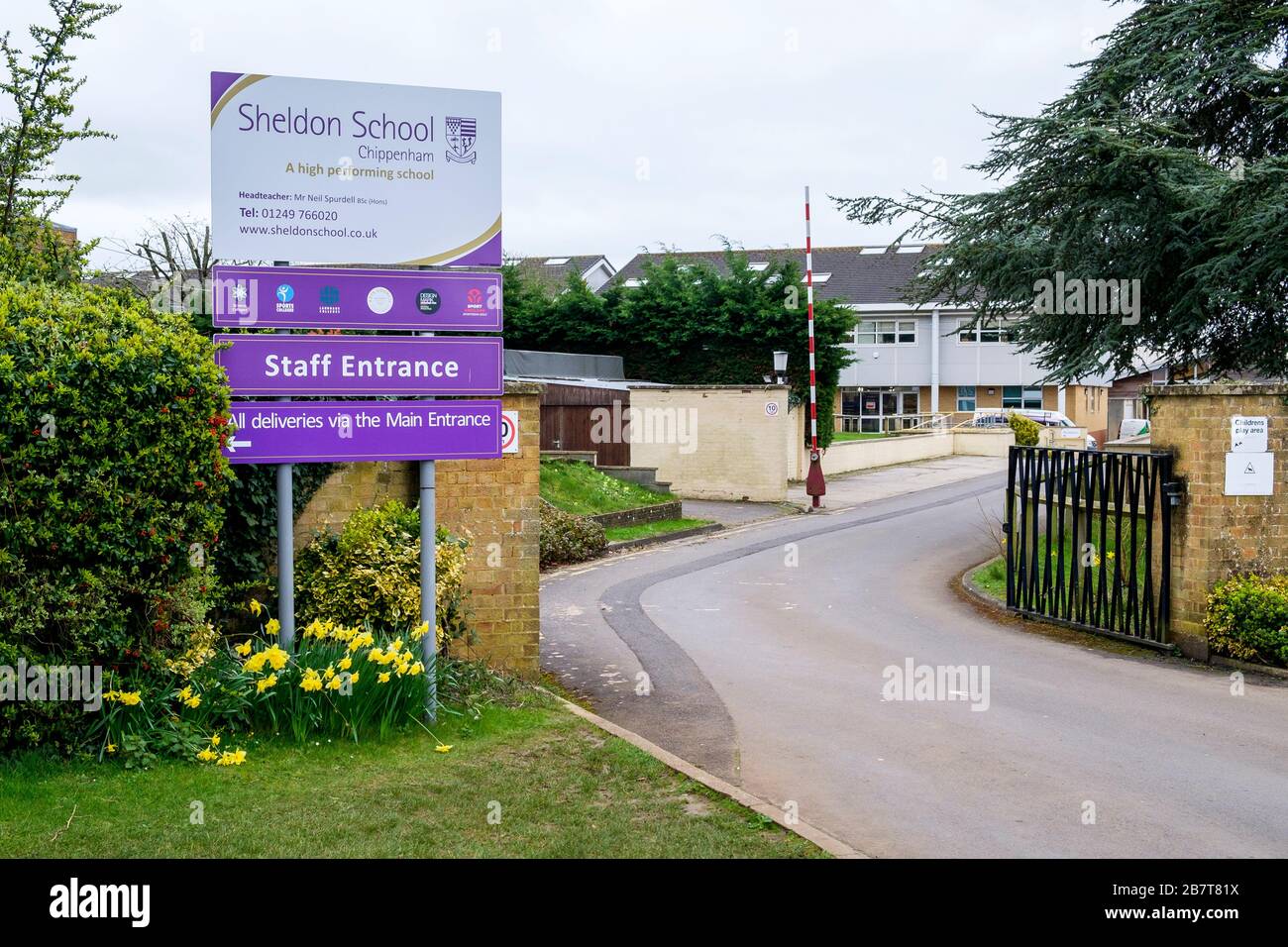 Chippenham, Wiltshire UK, 18th March, 2020. The entrance to Sheldon secondary school is pictured this morning as two large secondary schools in Chippenham, Wiltshire were closed to pupils.Hardenhuish and Sheldon schools announced on Tuesday that they would not open on Wednesday because of the coronavirus outbreak.Following the government’s recent advice regarding people self-isolating and social distancing to delay the spread of the Coronavirus both schools had been left with significant staff shortages and said they would remain shut until further notice. Credit: Lynchpics/Alamy Live News Stock Photo