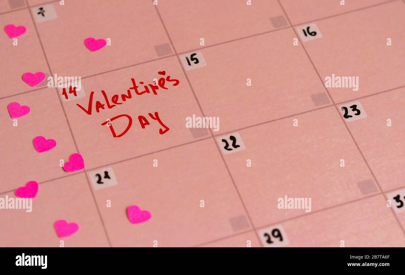The inscription Happy Valentine's Day on the pink calendar Stock Photo