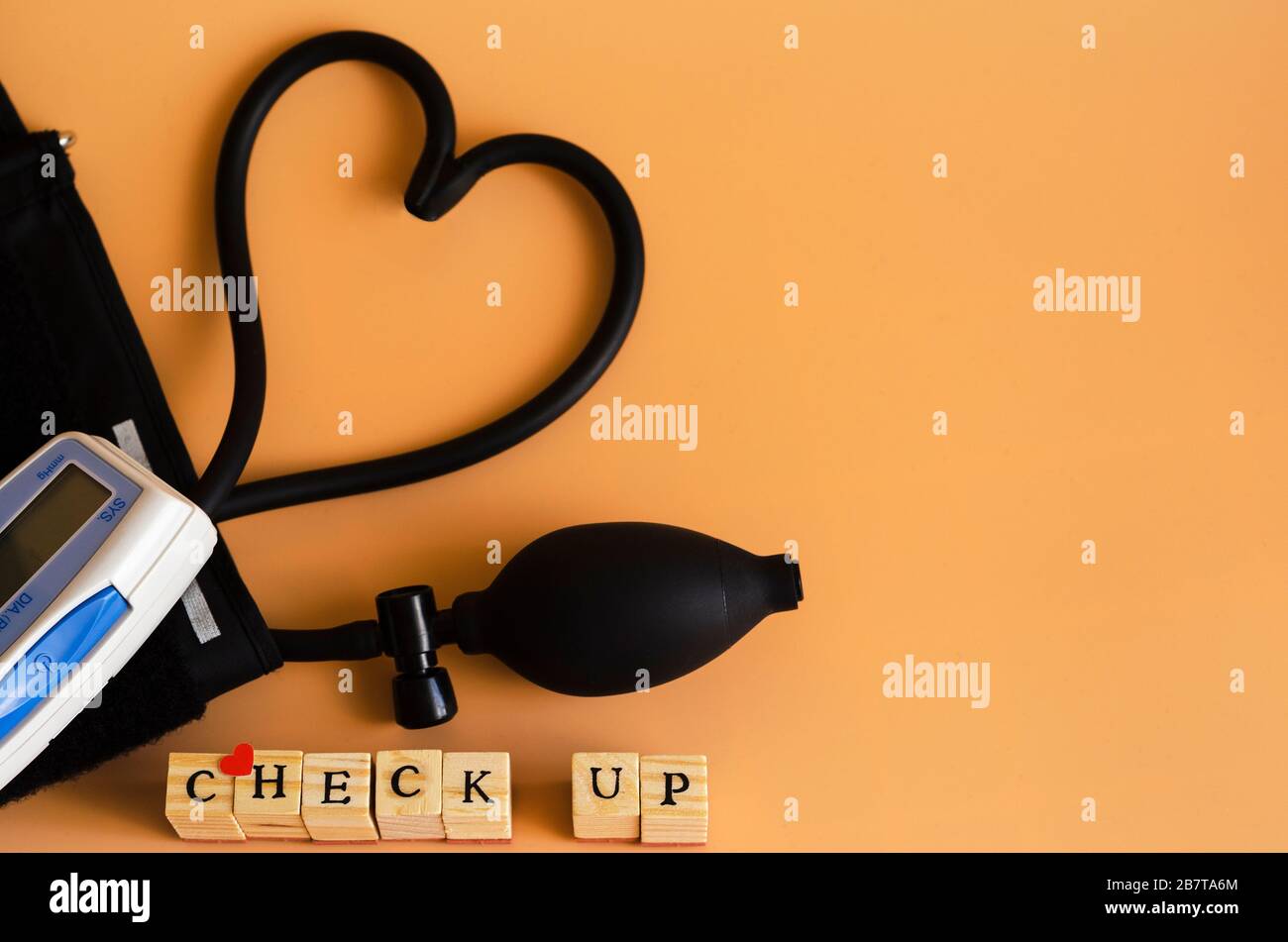 The word chesk up and a device for measuring blood pressure on an ...