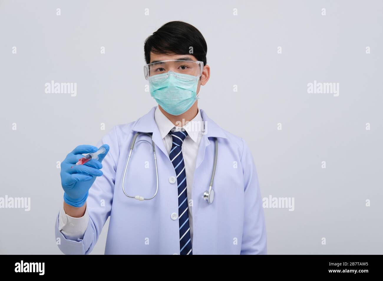 doctor physician practitioner with medicine syringe. medical injection ...