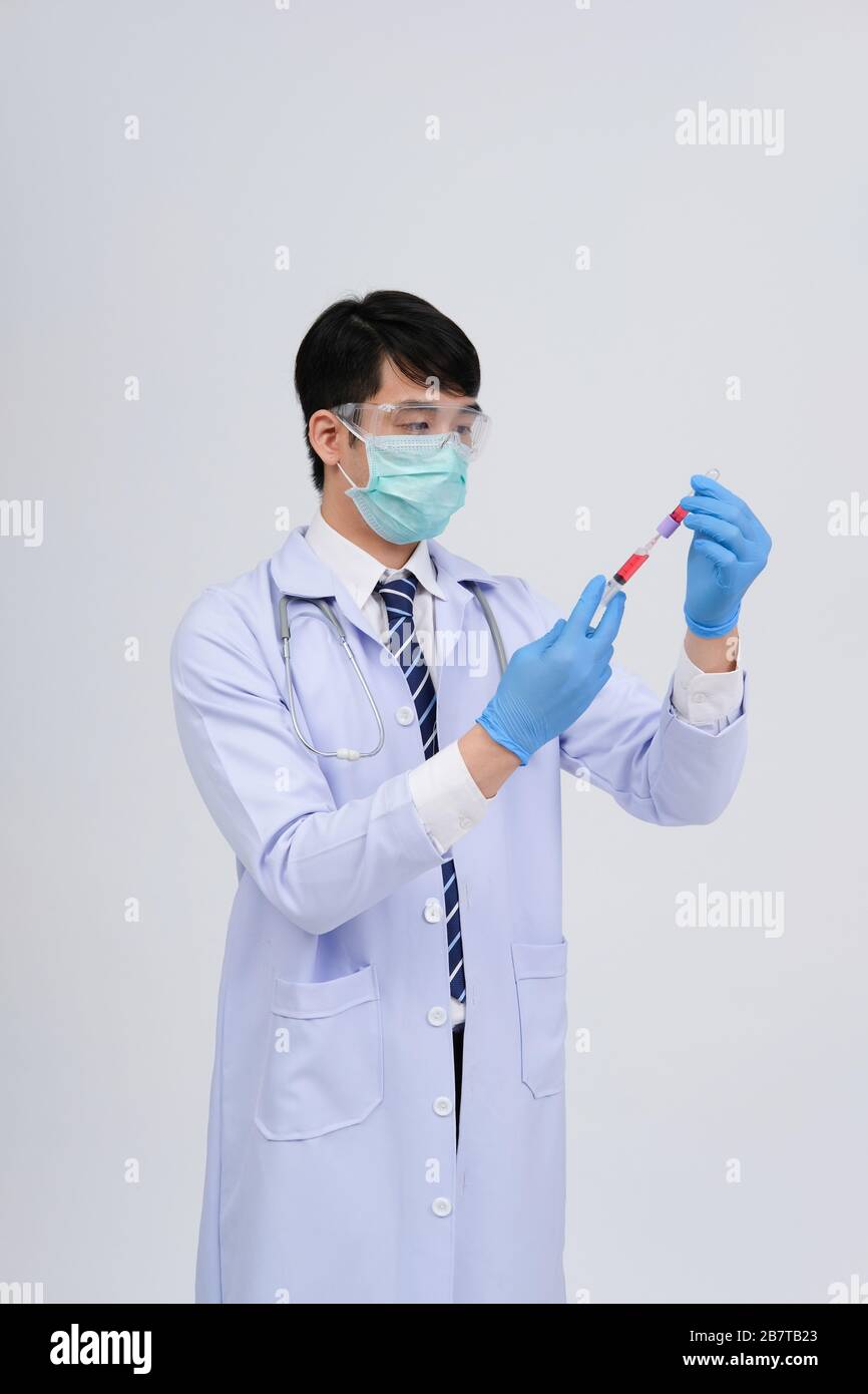 doctor physician practitioner with medicine syringe vial ampule ...