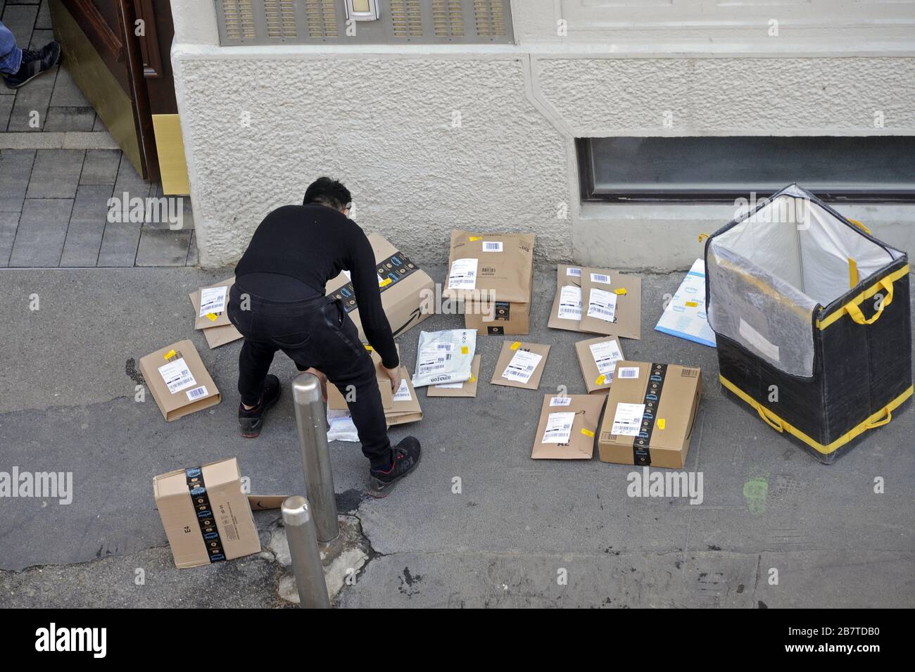 Milan (Italy), express courier for the delivery of Amazon parcels Stock Photo
