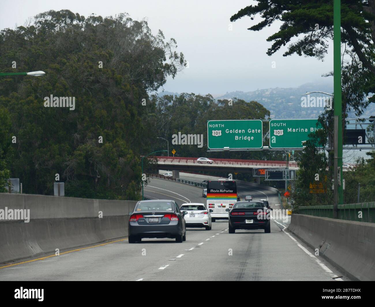 San Francisco, California-July 2018: Vehicles travel on the road with directional signs to the Golden Gate bridge and Marina Boulevard in San Francisc Stock Photo