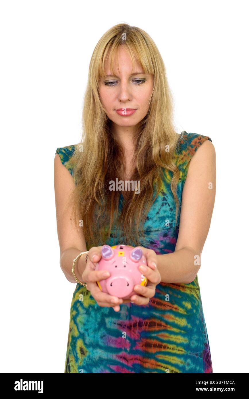 Portrait of beautiful blonde woman with piggy bank Stock Photo - Alamy