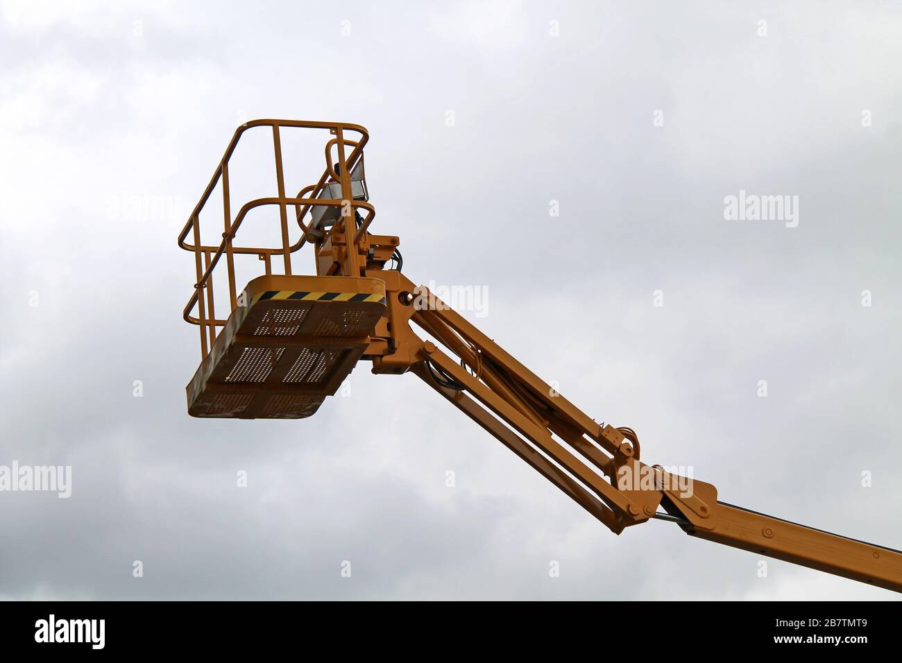 The Cage and Arm of an Hydraulic Lift Cherry Picker. Stock Photo