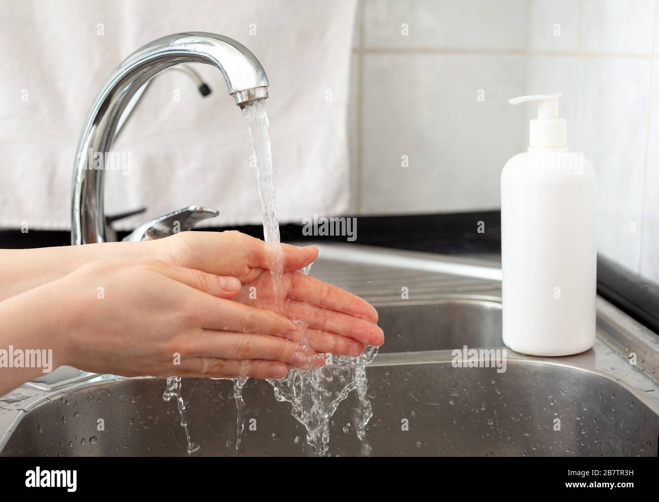 Woman washing hands with antibacterial soap and water. Hygiene concept ...