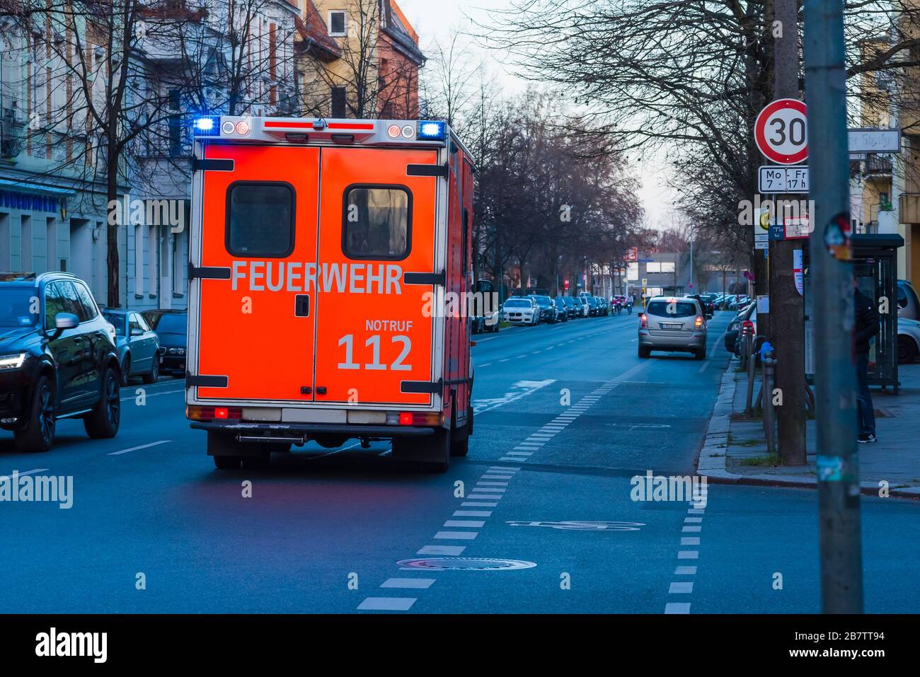 Ambulance photographed from behind, blue Stock Photo