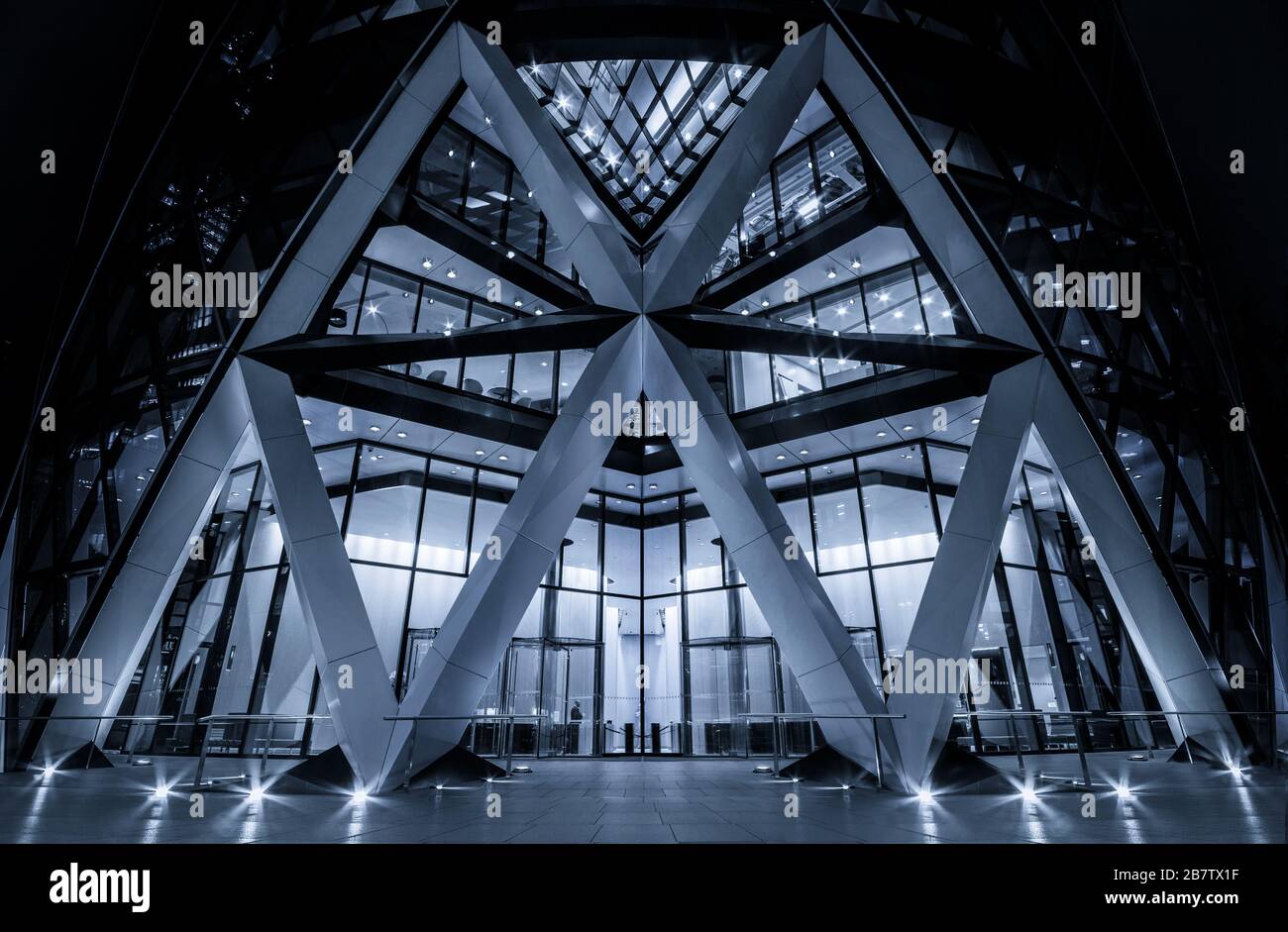 Night view of the entrance to the Gherkin building, 30 St Mary Axe, London, England. Stock Photo