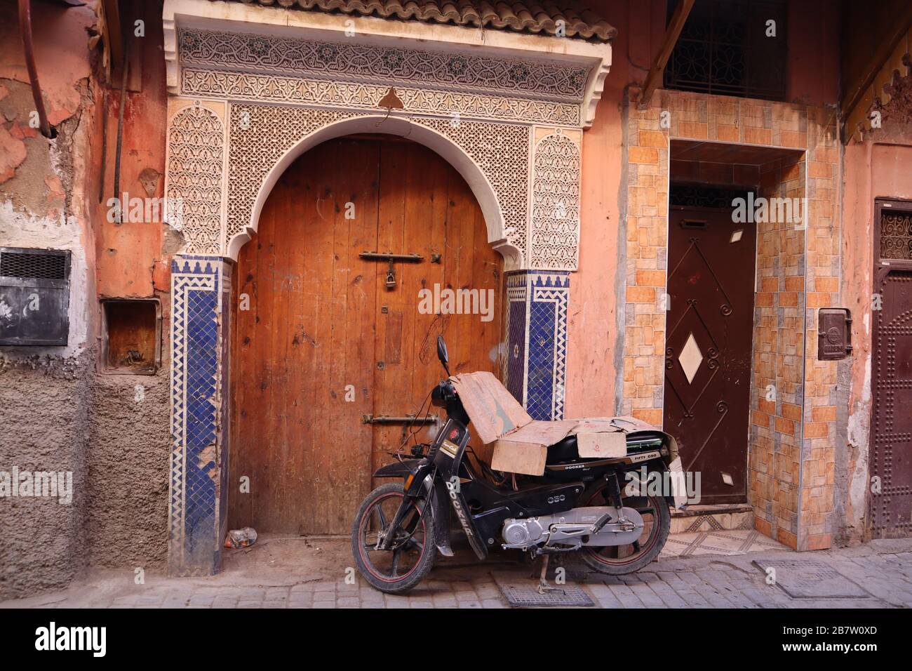 Moped parked near Jmaa el-Fnaa Main Square Marrakesh Medina Stock Photo