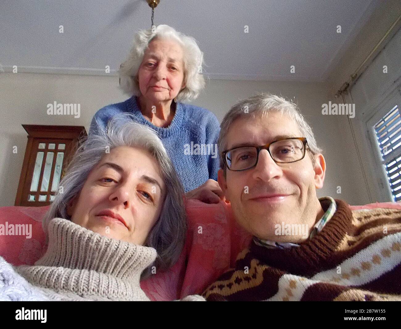 Mature couple and elderly woman. Stock Photo