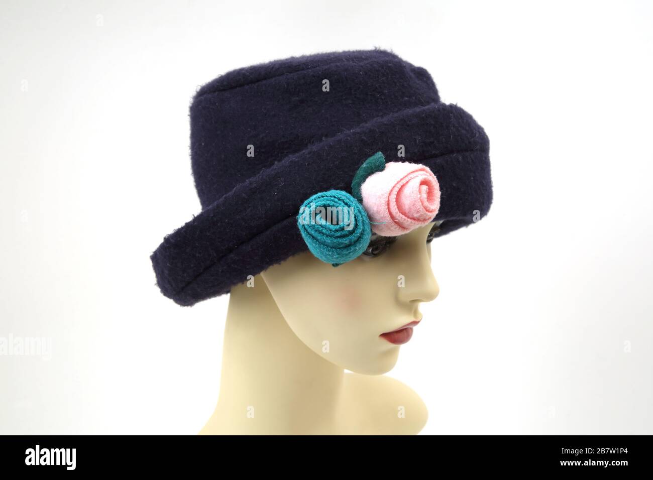 Cloche Felt Winter Hat with Removable Flowers Stock Photo