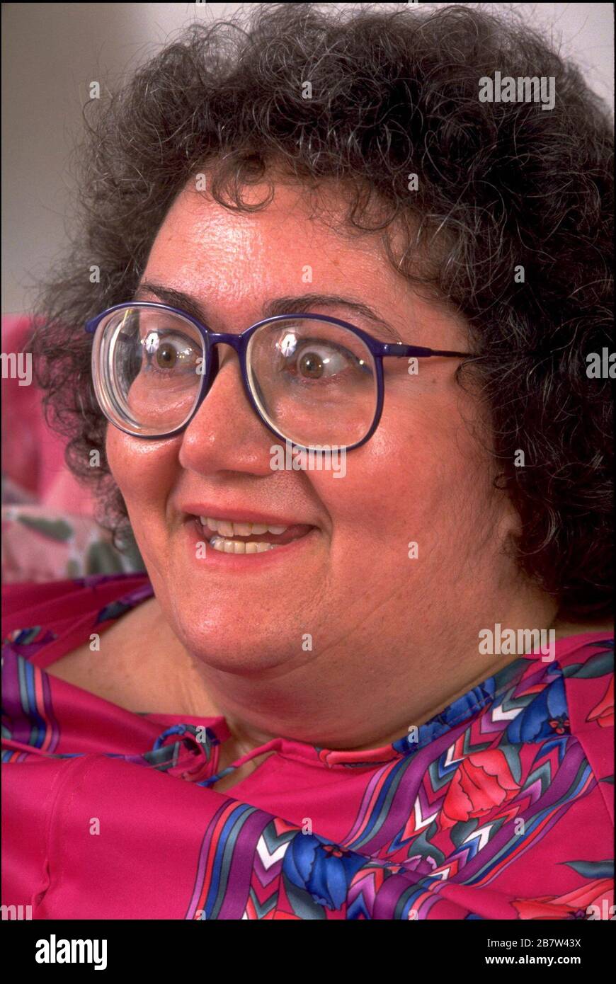 Killeen Texas USA, 1993: Morbidly obese woman weighing 600+ lbs. is confined to her bed due to her inability to move safely around her house.  MR ©Bob Daemmrich Stock Photo