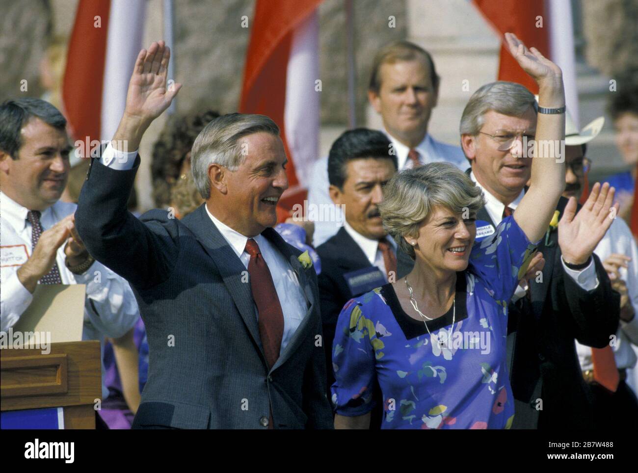 Austin, Texas USA, 1984: Democratic presidential candidate Walter Mondale and his vice presidential pick Geraldine Ferraro wave to an enthusiastic crowd during a rally at the Texas Capitol. Ferraro is the first woman nominated to a major party presidential ticket. Texas Gov. Mark White is on the far right. ©Bob Daemmrich Stock Photo
