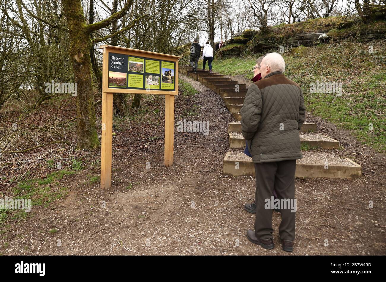 People visit National Trust Brimham Rocks, North Yorkshire, as coronavirus continues to affect the UK with the death toll in the UK reaching 71 people. Stock Photo