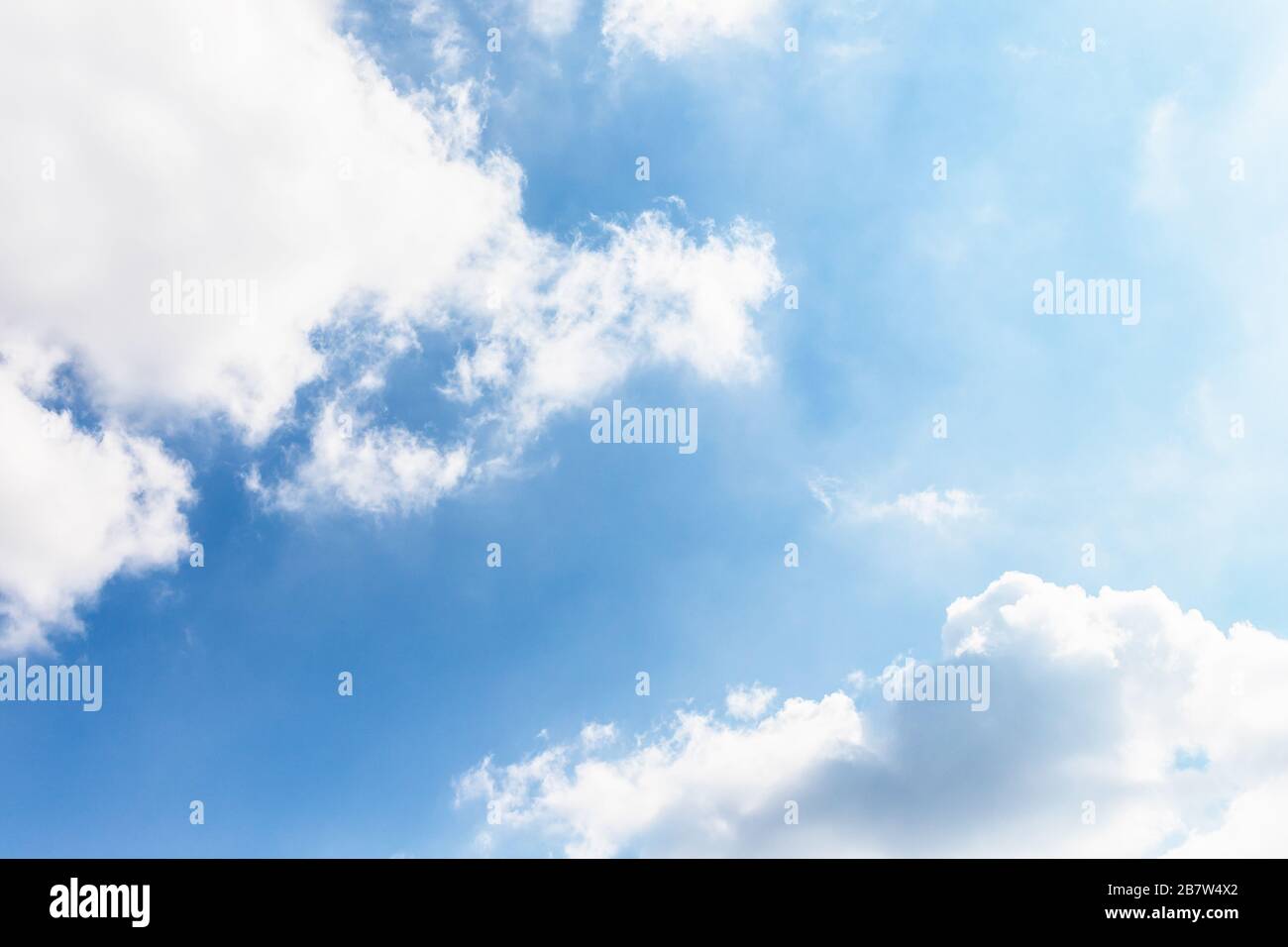 Blue sky background. Amazing sky with fluffy white clouds Stock Photo ...