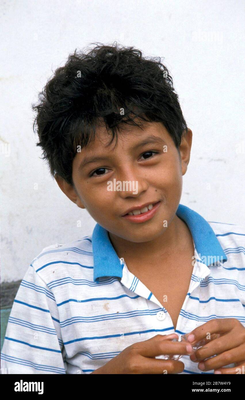 Honduran boy poses for camera. ©Bob Daemmrich Stock Photo Alamy