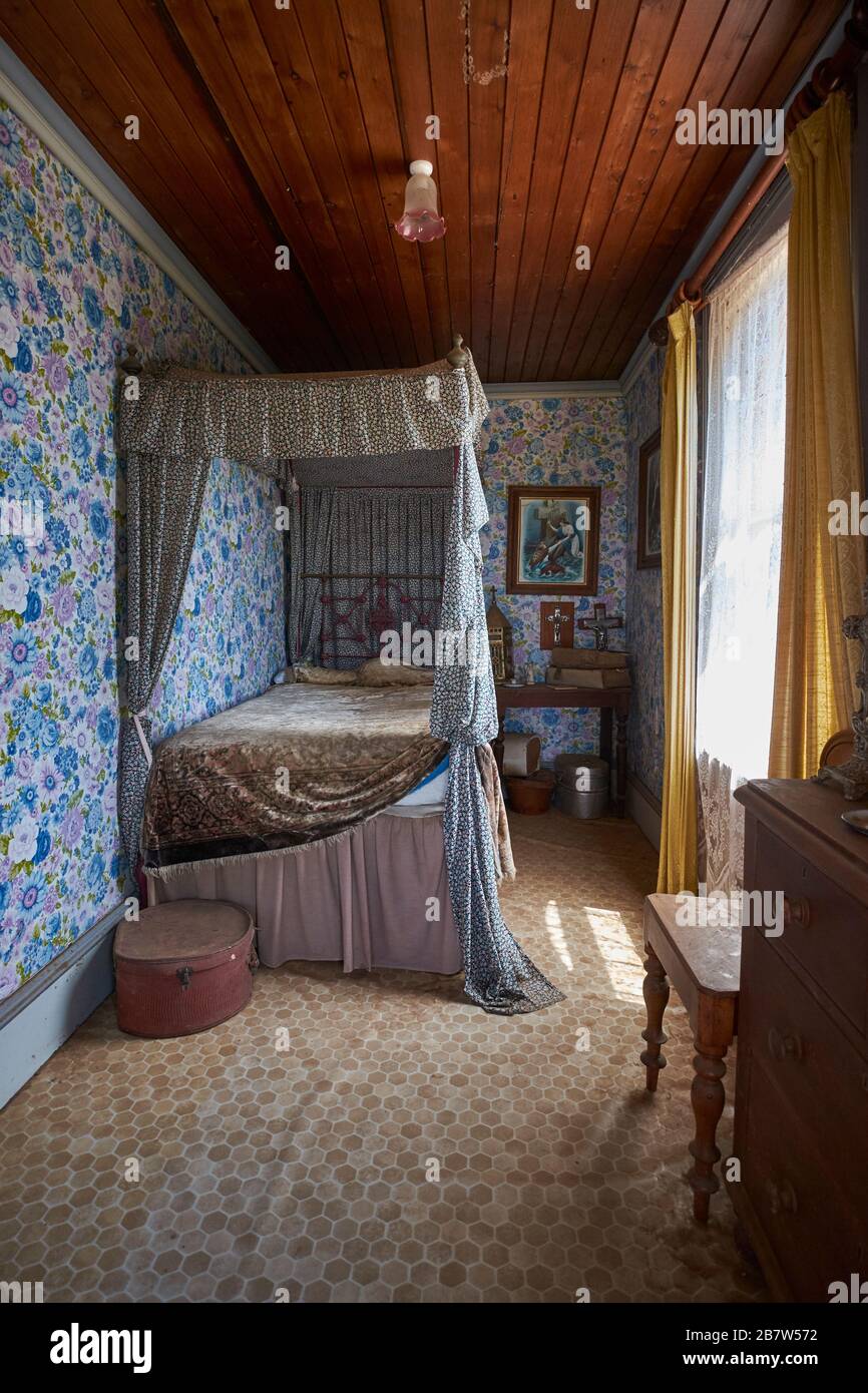 Maid's bedroom at the Crawley mansion. At the Monte Cristo Colonial Homestead Museum in Junee, NSW, Australia. Stock Photo