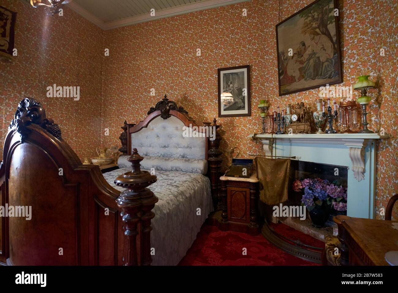 Bedroom in the Crawley mansion. At the Monte Cristo Colonial Homestead Museum in Junee, NSW, Australia. Stock Photo